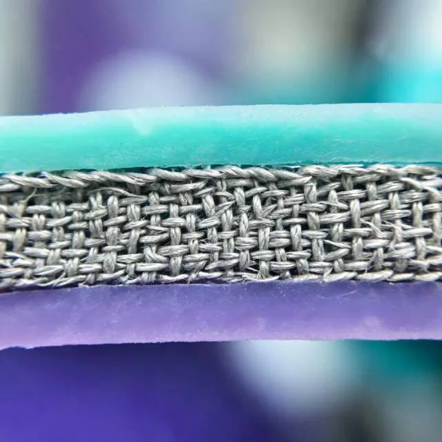 Coated fabric layers under a materials microscope